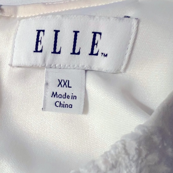 Elle in women’s dress - Picture 8 of 9